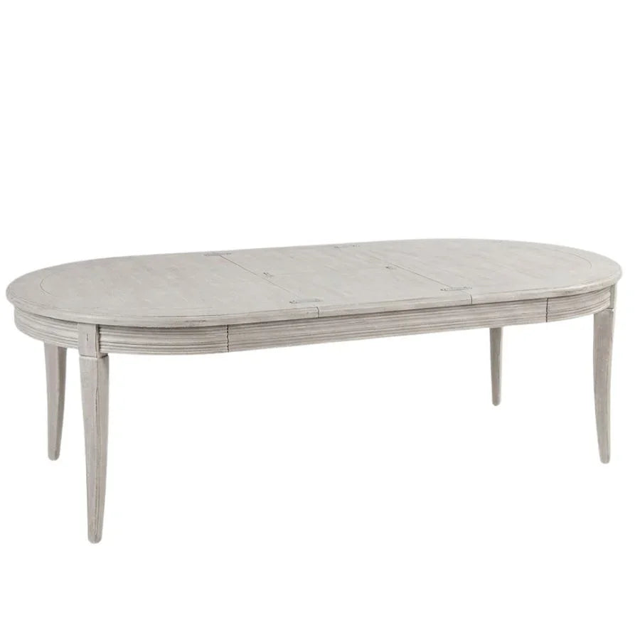 Elegant oval dining table in French country style with extendable design and light gray finish