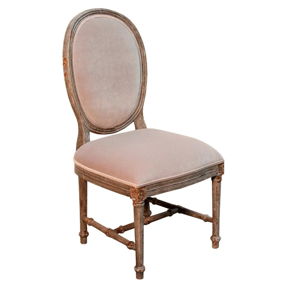 French country oval back side chair with weathered wood frame and dusty rose velvet upholstery.