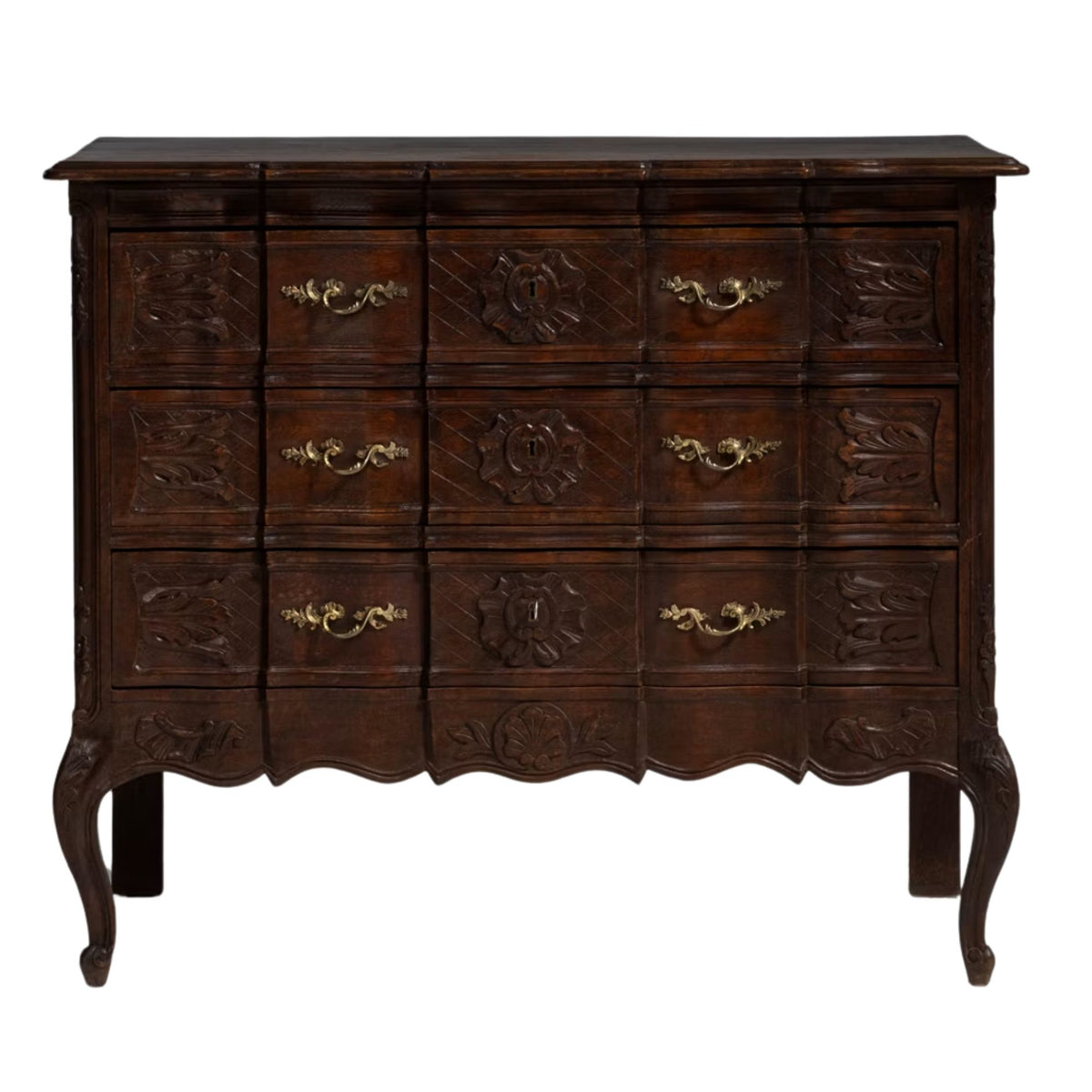 19th-century French chest with original patina, carved details, brass hardware, and cabriole legs.