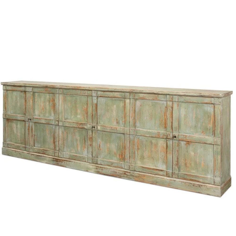 Distressed green farmhouse sideboard with rustic panel doors and vintage charm