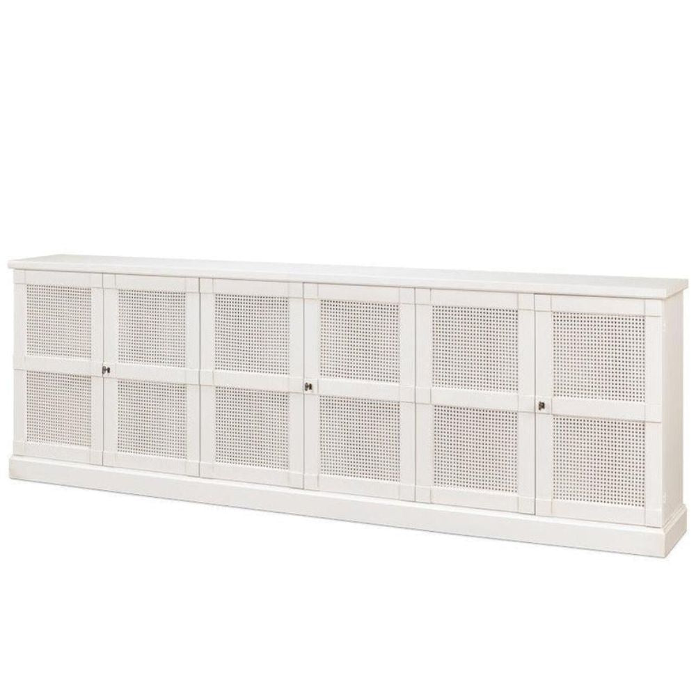 White coastal-style sideboard with cane panel doors and farmhouse design