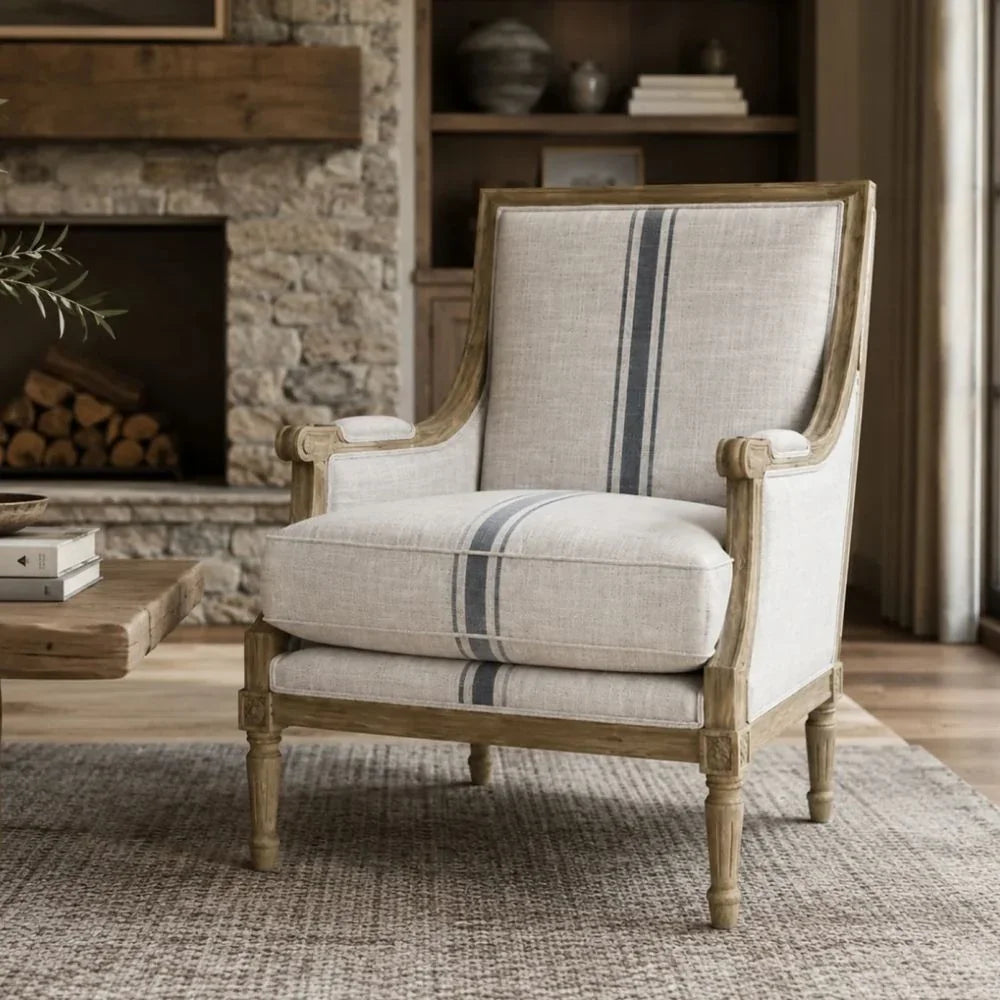 French country armchair with blue stripe upholstery, rustic wood frame, cozy living room setting