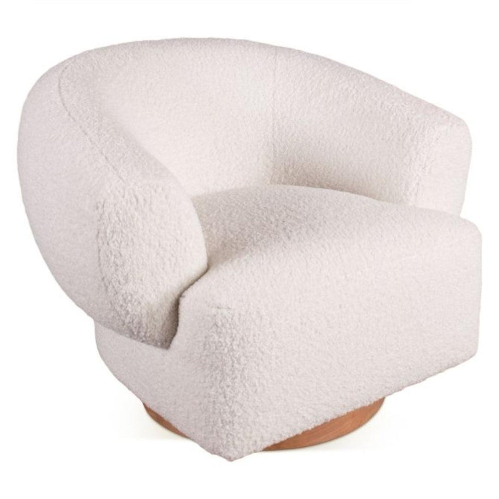 Cream bouclé swivel armchair with curved back and wooden base in natural boho style.