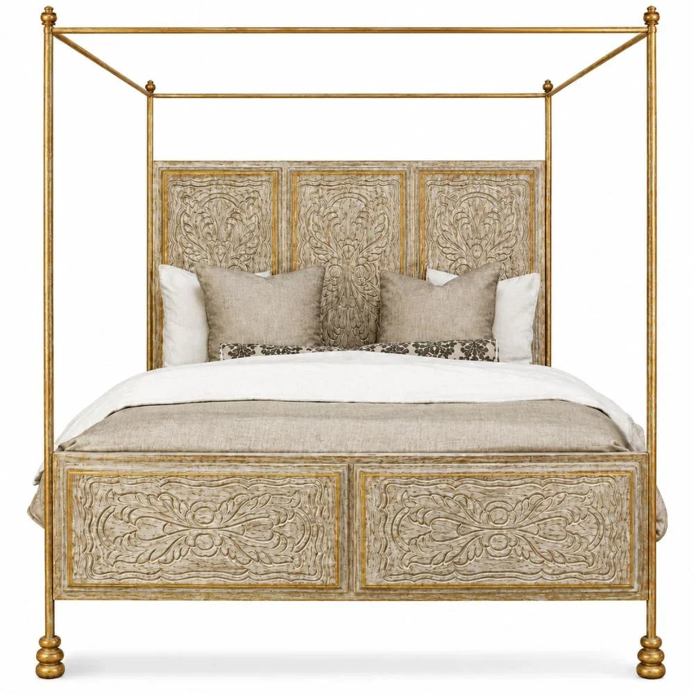 Elegant gold canopy bed with ornate carvings in French country style