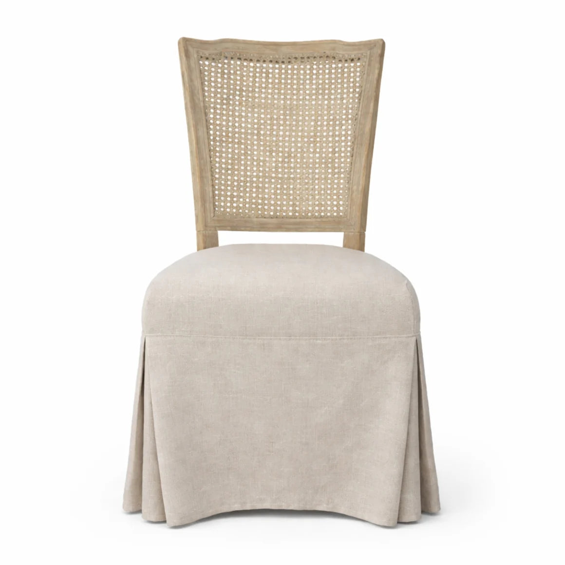 Marlowe oak dining chair with woven cane back, linen upholstered seat, and skirted silhouette in classic French country style.