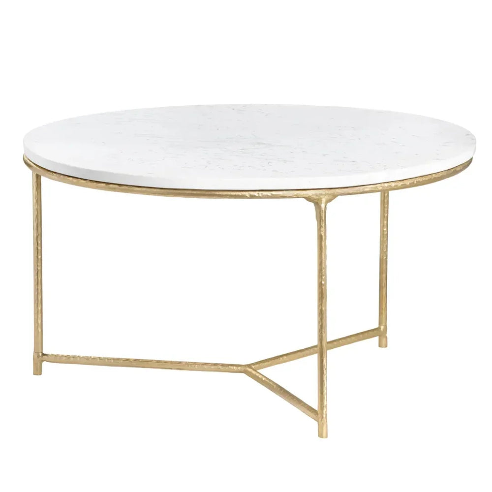 Round white marble top coffee table with a textured gold metal base in a modern chic style.