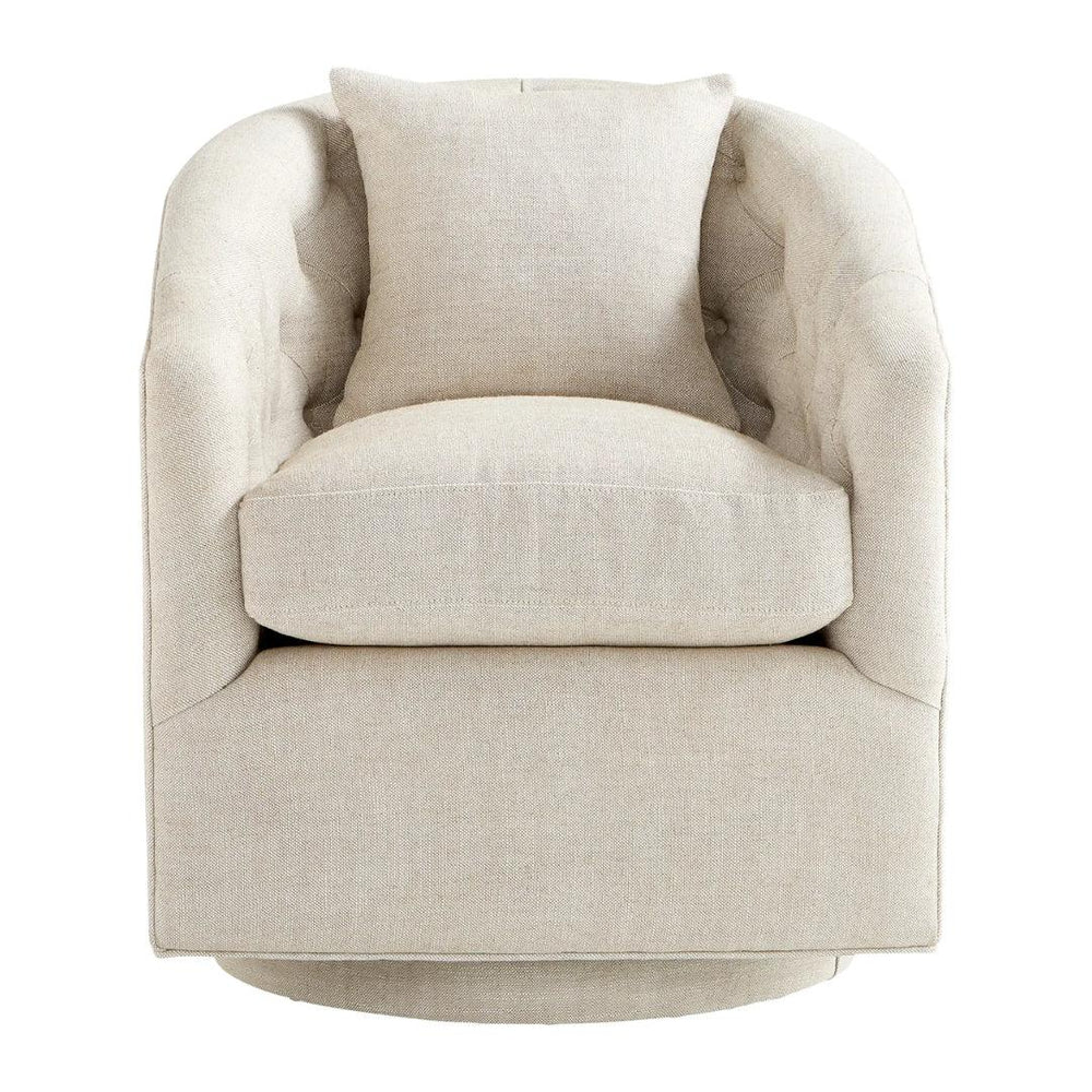 Beige French country swivel armchair with a matching throw pillow.