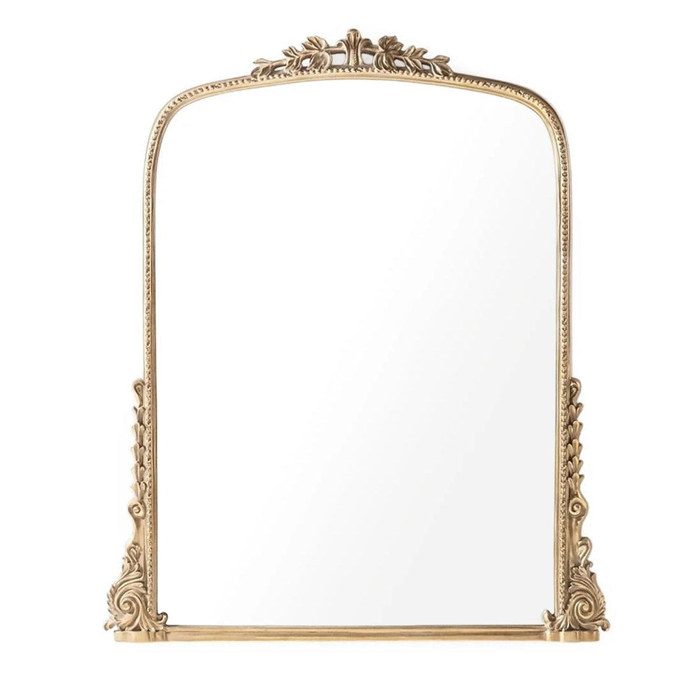 Ornate gold arched wall mirror with vintage French country style carvings.