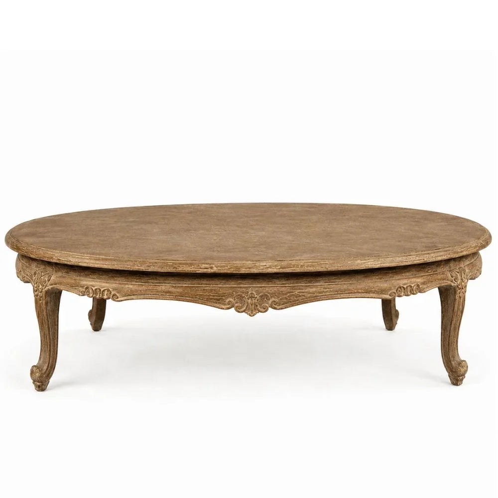 Oval French country coffee table with carved legs and rustic finish