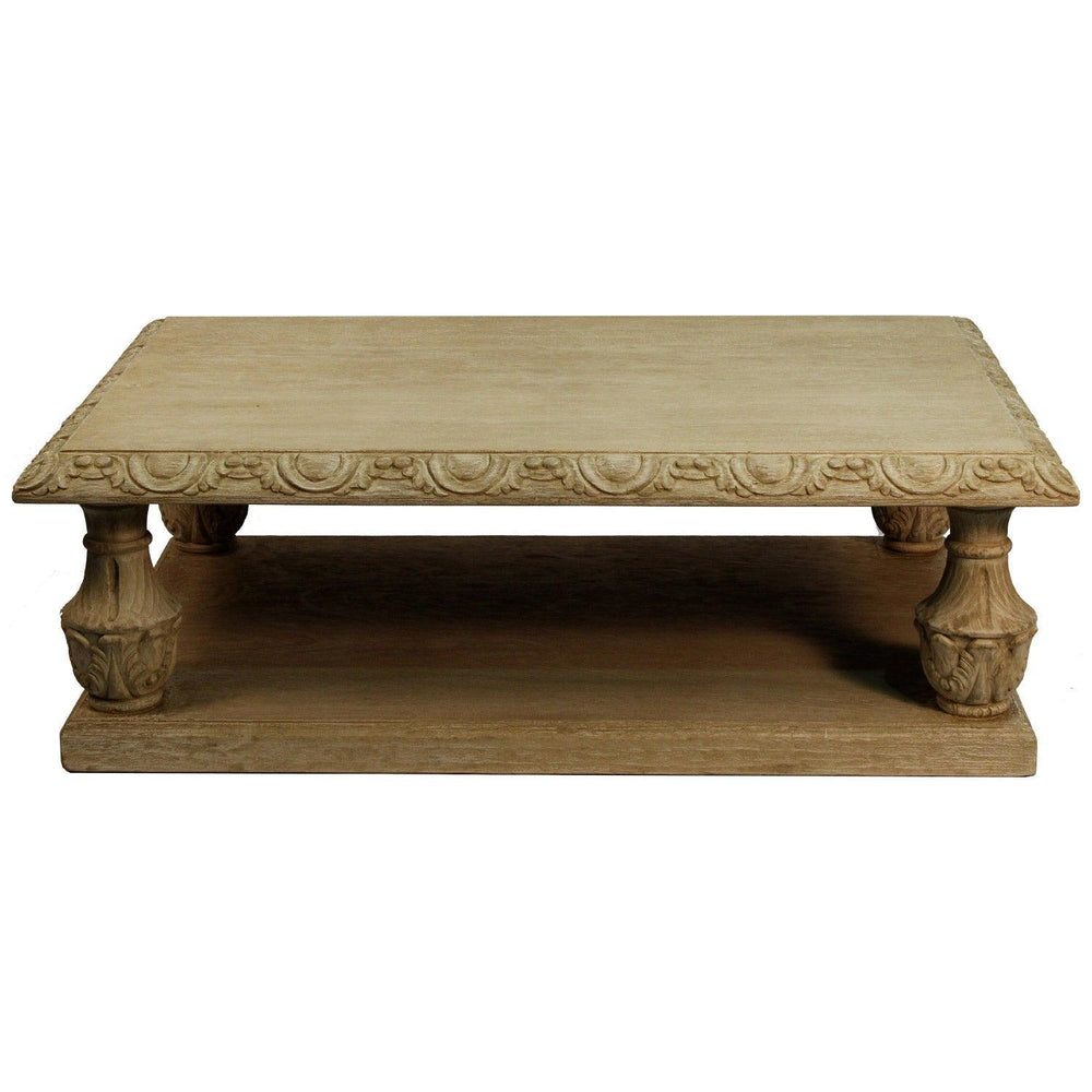 Natural wood French country style coffee table with carved details and lower shelf.