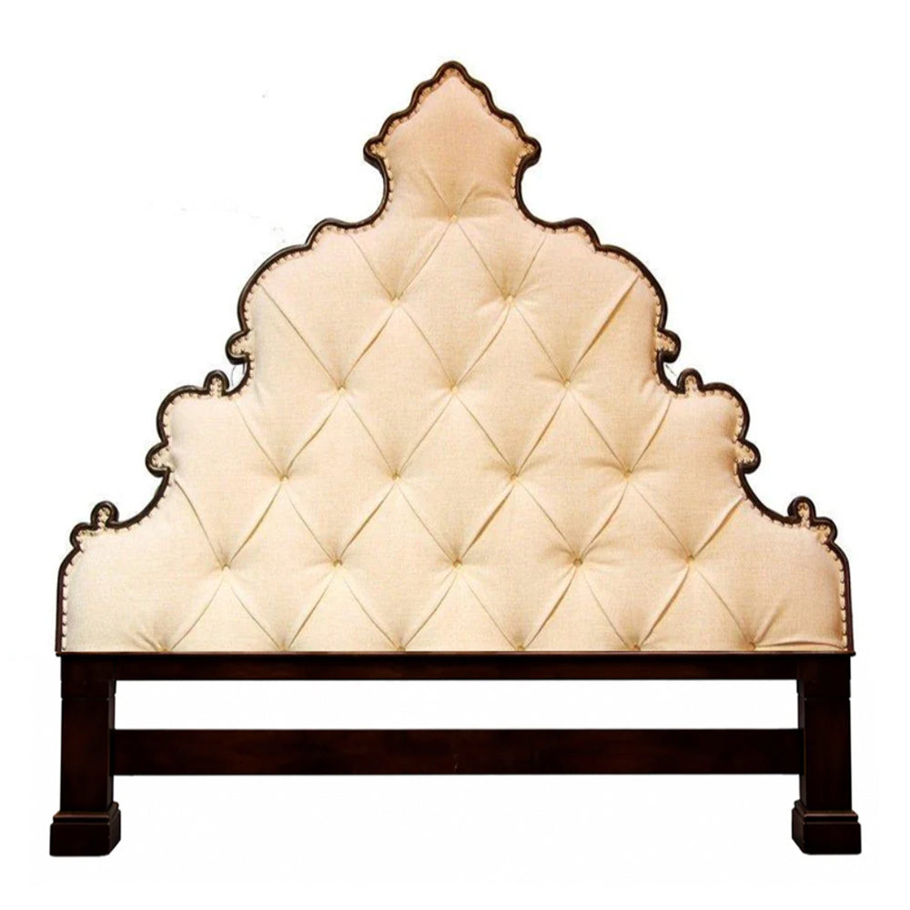 Regal Ornately Carved Tufted Bed