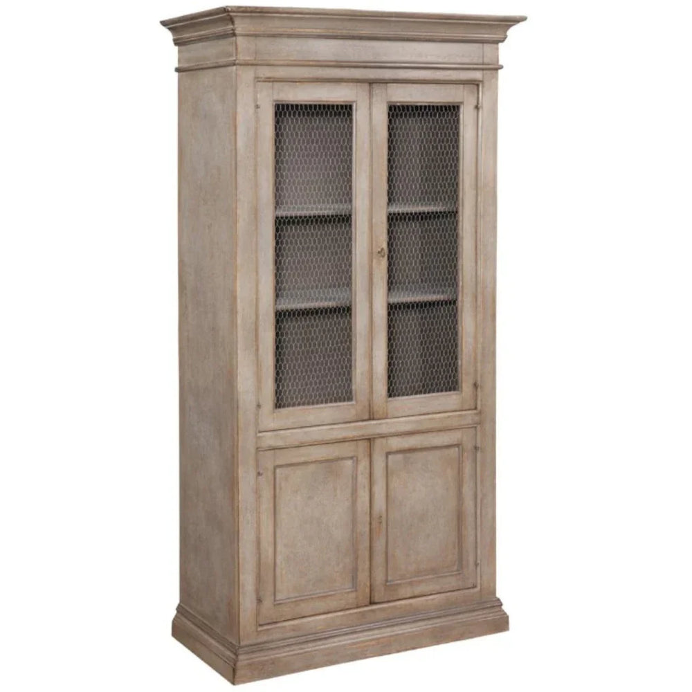 Rustic farmhouse cabinet with chicken wire doors and distressed finish