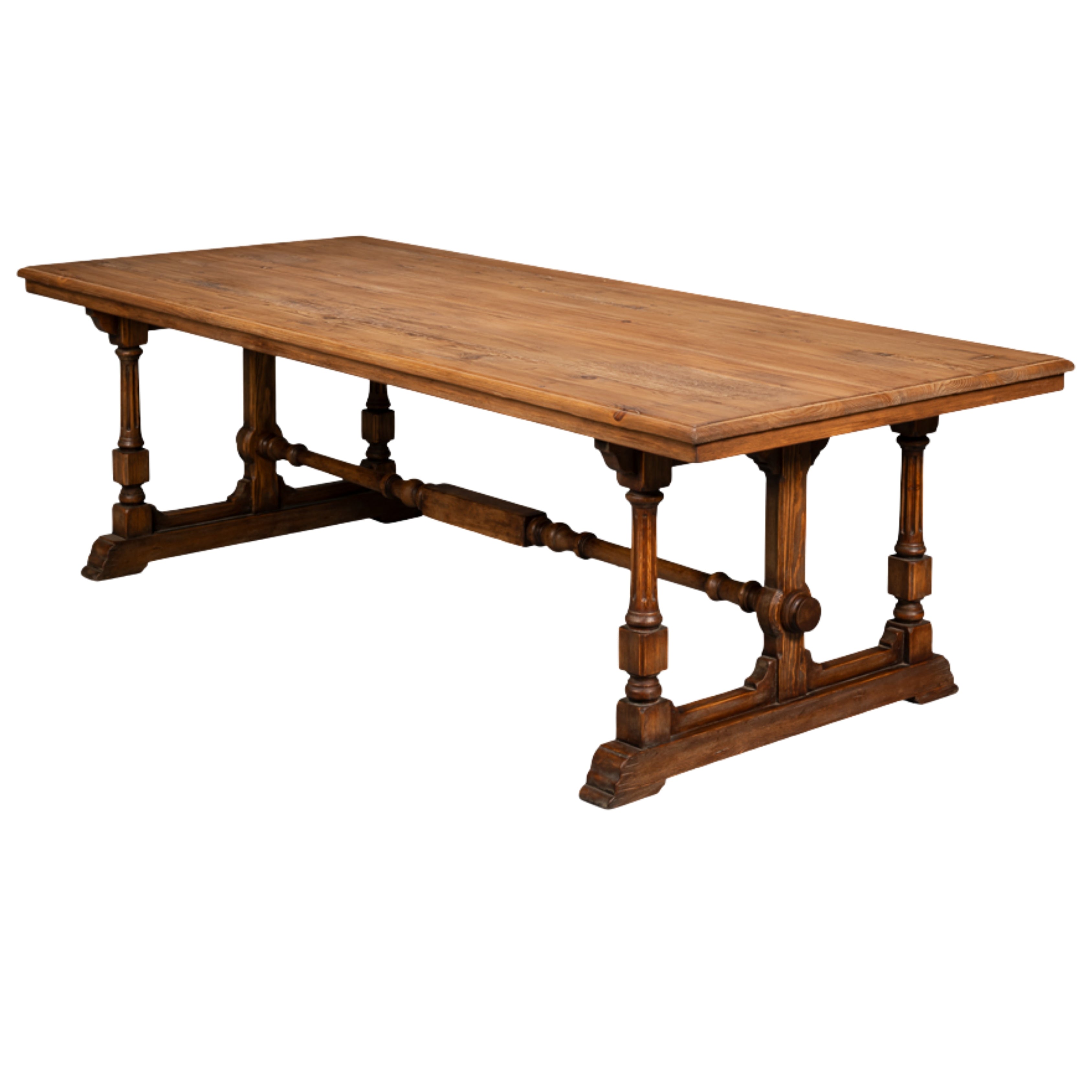 A rustic wooden dining table with a rectangular apron top and turned trestle-style legs, shown on a plain white background.