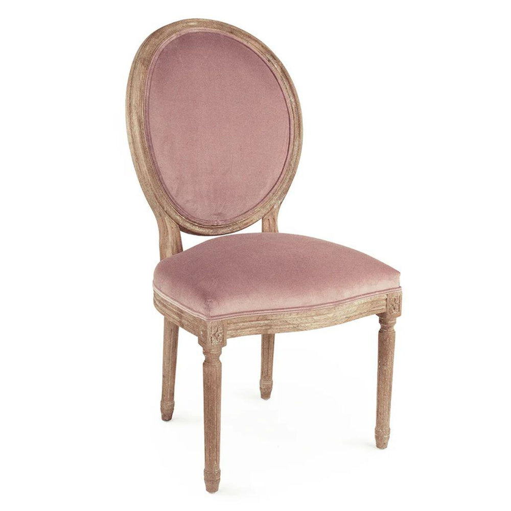 Pink velvet oval medallion dining chair with rustic wood frame in French country style.