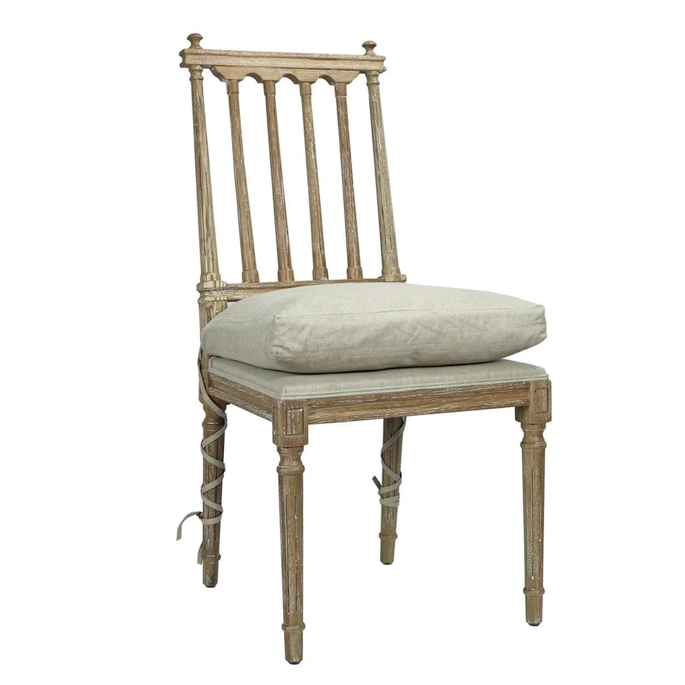 French country style wooden dining chair with cream cushion and distressed white finish