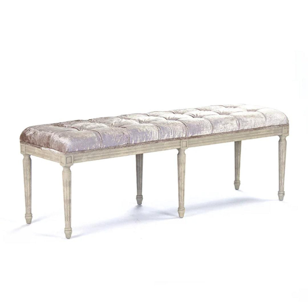 Tufted velvet bench with a grey wooden frame in French country style.