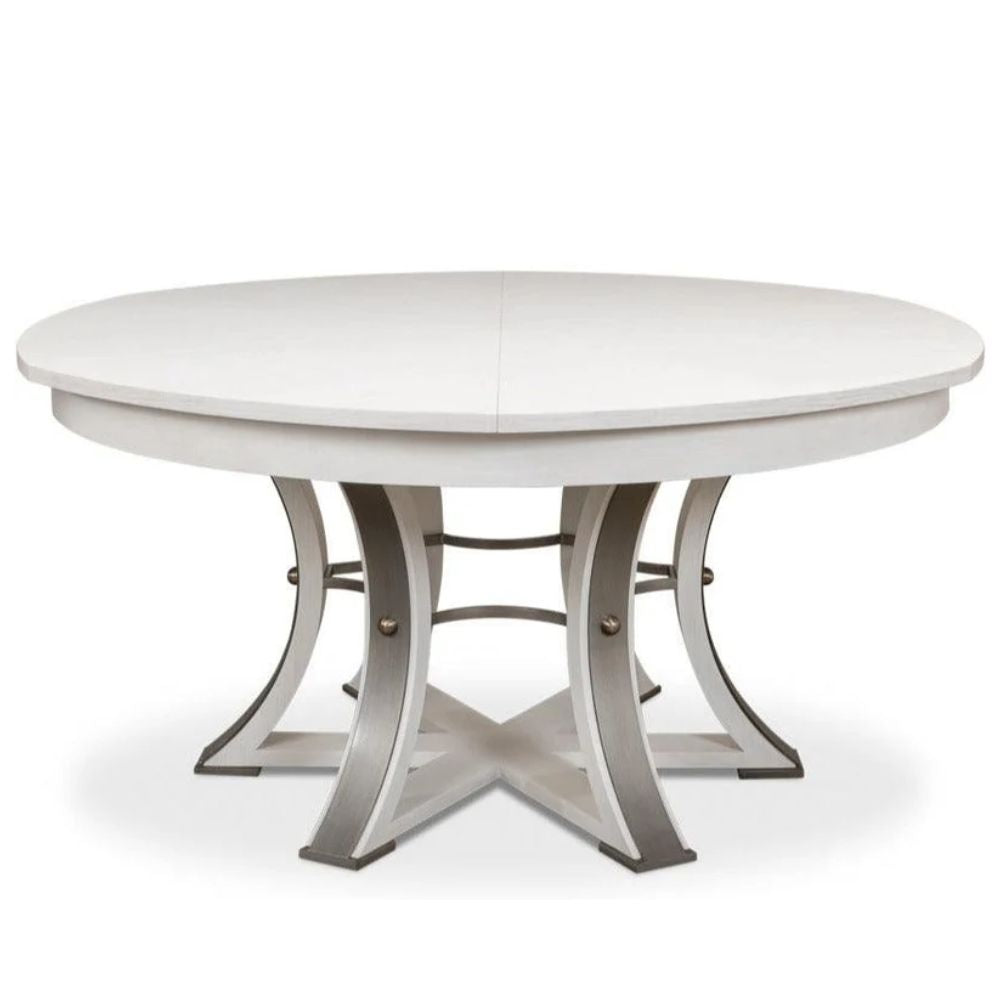 White French country style round pedestal dining table with a carved base.