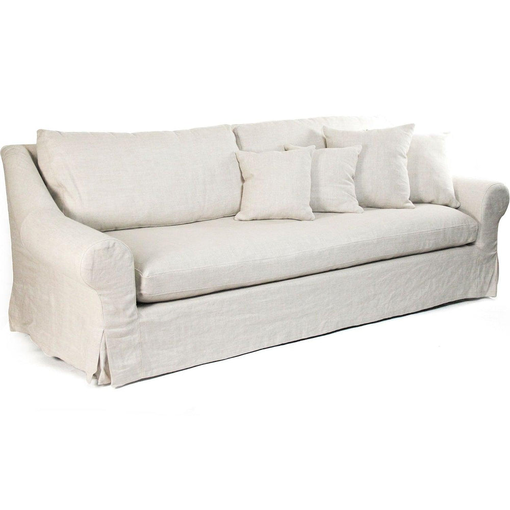 Cream linen slipcover sofa with rolled arms and matching throw pillows, ideal for farmhouse or shabby chic decor