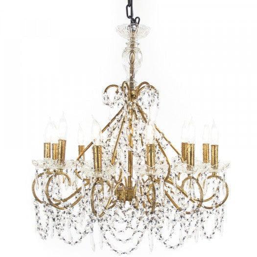 Elegant gold and crystal chandelier in French country style.
