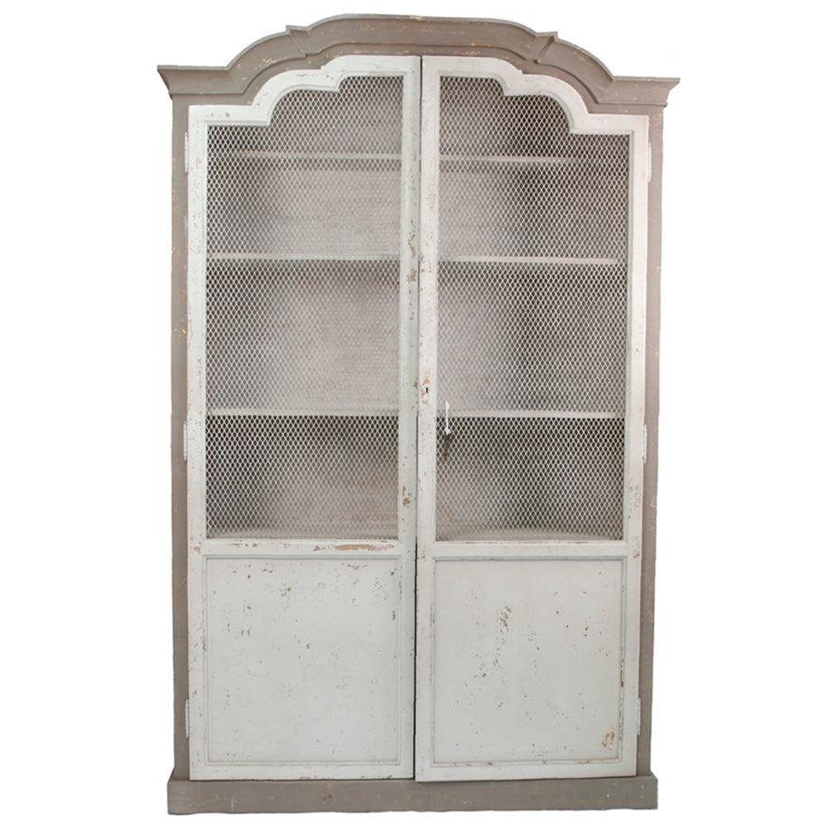 Shabby chic armoire with mesh doors and distressed finish, perfect for French country decor