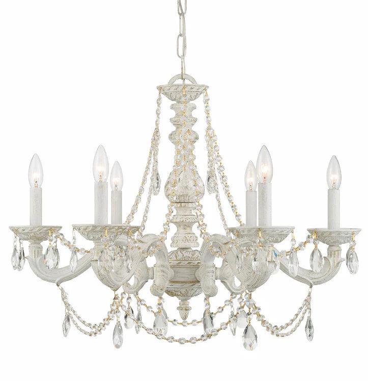 Distressed white French country chandelier with crystal accents and candle lights.